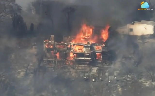 Fire engulfs a home in La Habra Heights on Monday afternoon