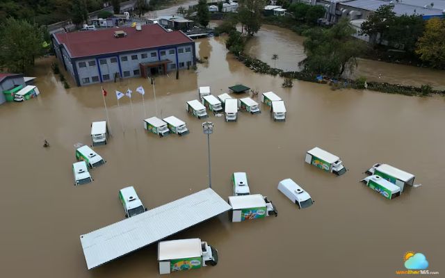 Buildings and cars submerged in water duet to severe flooding 