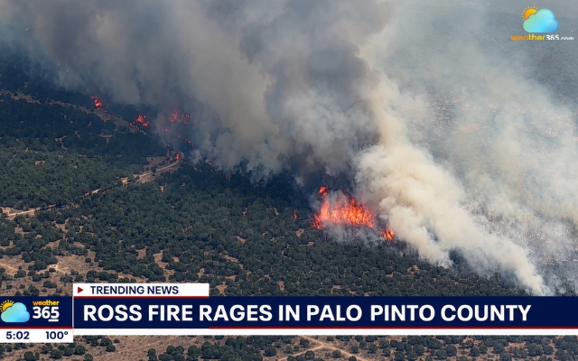 Thick smoke rises as the Ross Fire spreads across Palo Pinto County, Texas